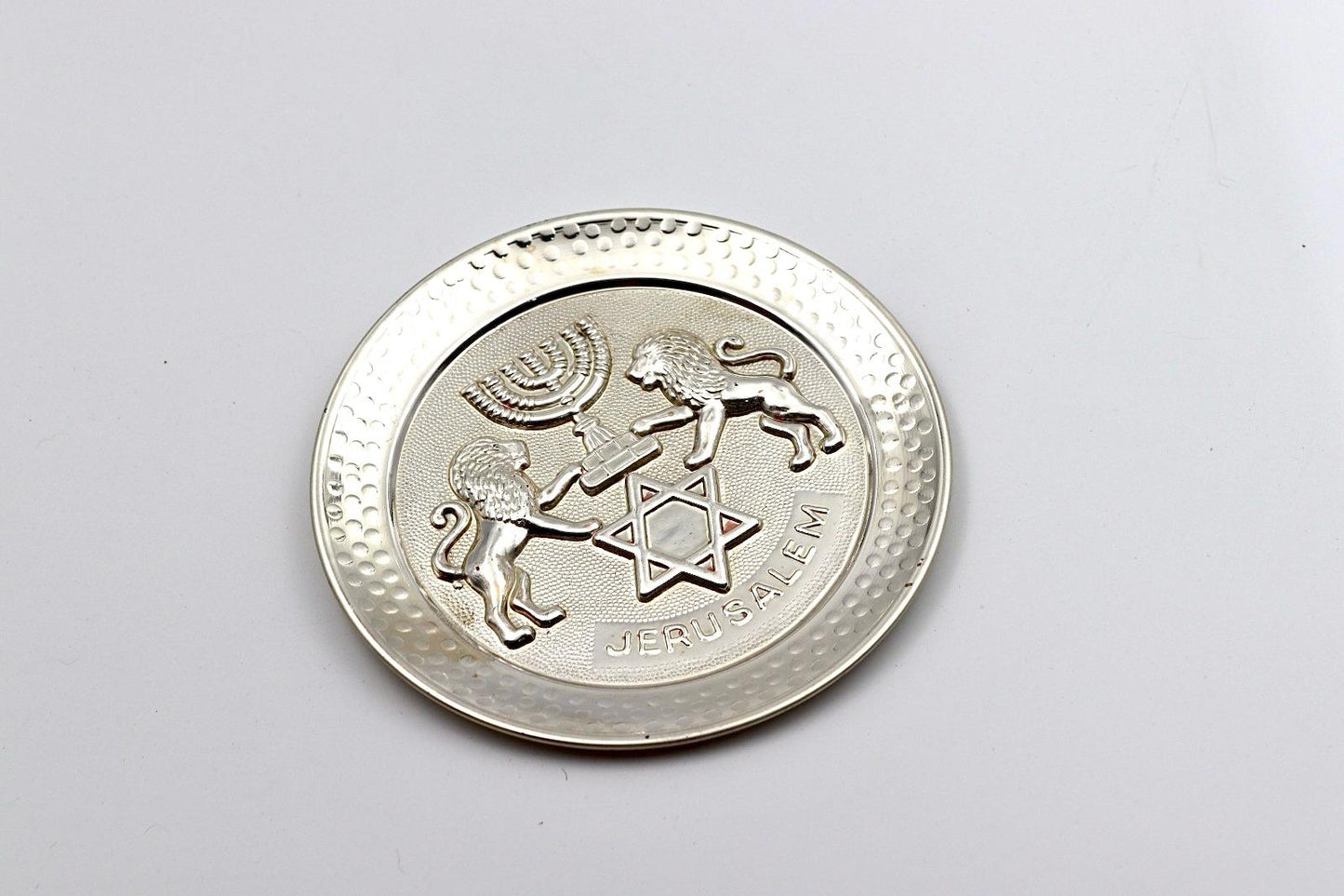 ריקוע נחושת ״שער האריות״